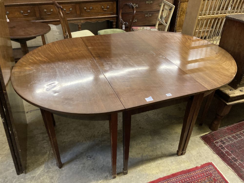 A George III mahogany D end extending dining table, 240cm extended (three spare leaves), width 121cm height 77cm